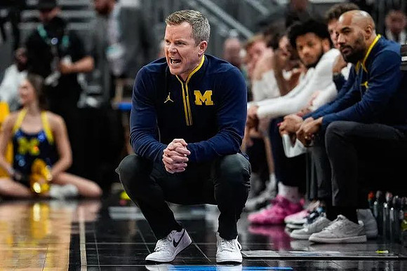 Dusty May and Michigan Team
