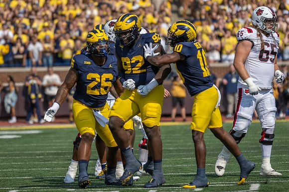 Rayshaun Benny (26), Ike Iwunnah (92), and Zeke Berry (10)