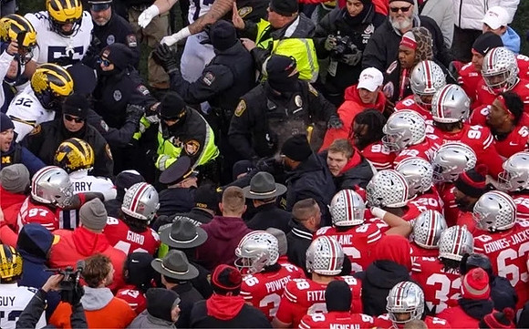 Mason Graham (55), Ike Iwunnah (92), Zeke Berry (10), and TJ Guy (42)