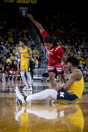 Kobe Bufkin (2) and Tarris Reed Jr. (32)