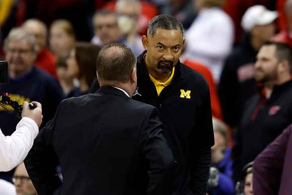 Wisconsin Head Coach Greg Gard and Juwan Howard