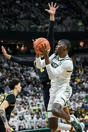 Brandon Johns Jr. (23) and Kobe Bufkin (2)