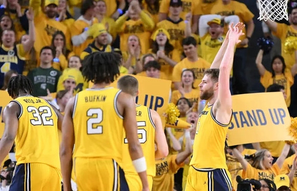Tarris Reed Jr. (32), Kobe Bufkin (2), Joey Baker (15), and Hunter Dickinson (1)