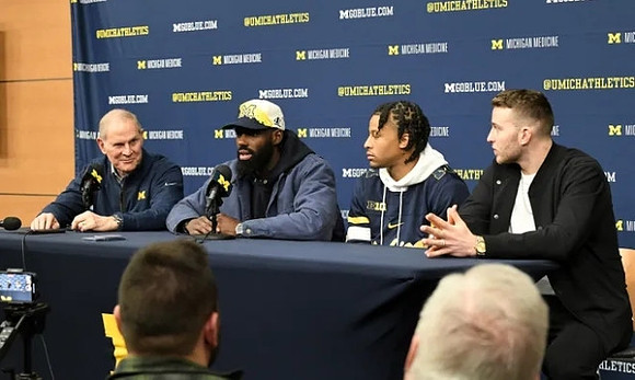John Beilein, Tim Hardaway Jr., Trey Burke, and Nik Stauskas