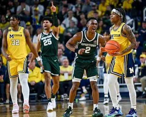 Tarris Reed Jr. (32) and Dug McDaniel (0)