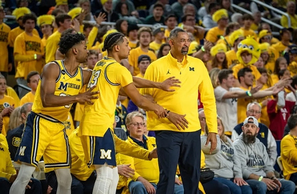 Jace Howard (25), Jett Howard (13), and Juwan Howard
