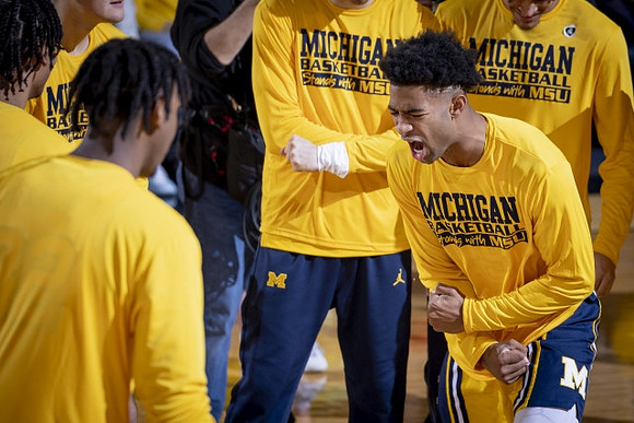 Tarris Reed Jr. (32) and Jace Howard (25)