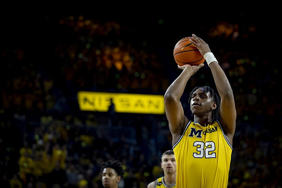 Joey Baker (15) and Tarris Reed Jr. (32)