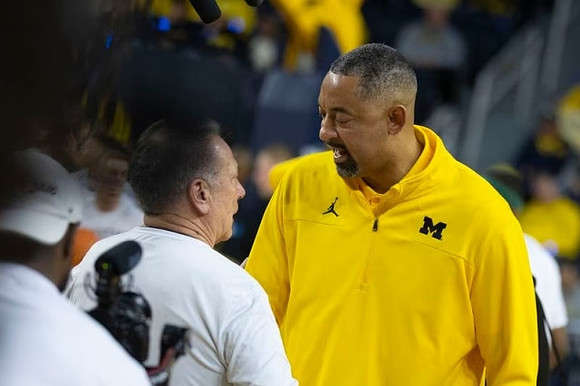 Michigan State Head Coach Tom Izzo and Juwan Howard