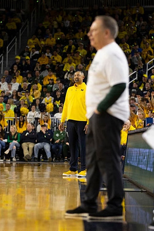 Juwan Howard and Michigan State Head Coach Tom Izzo