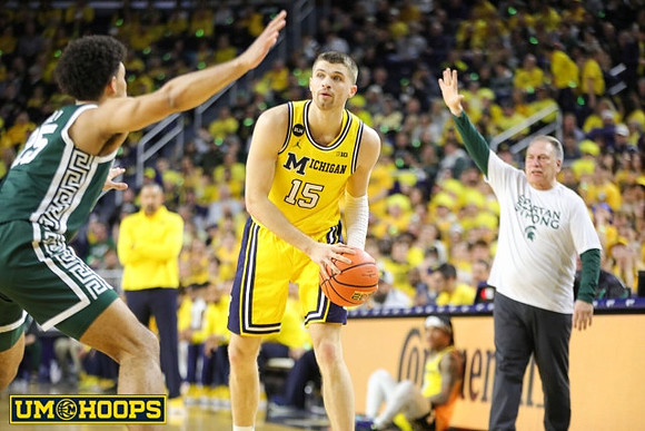 Joey Baker (15) and Michigan State Head Coach Tom Izzo