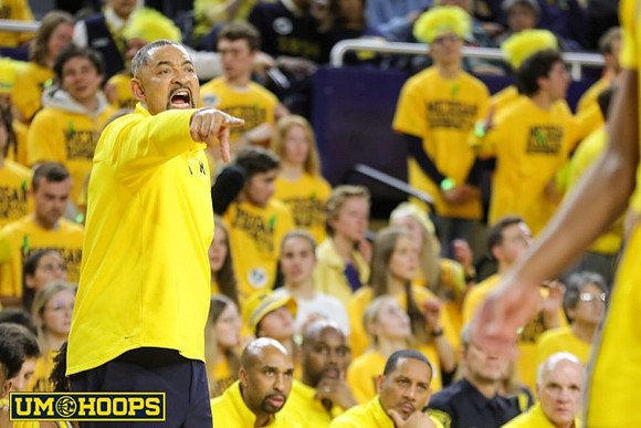 Juwan Howard, Saddi Washington, Howard Eisley, and Phil Martelli