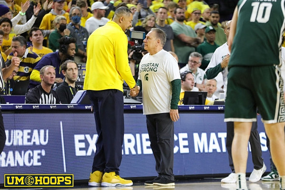 Juwan Howard and Michigan State Head Coach Tom Izzo