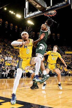 Dug McDaniel (0) and Will Tschetter (42)