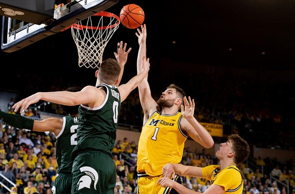 Hunter Dickinson (1) and Will Tschetter (42)