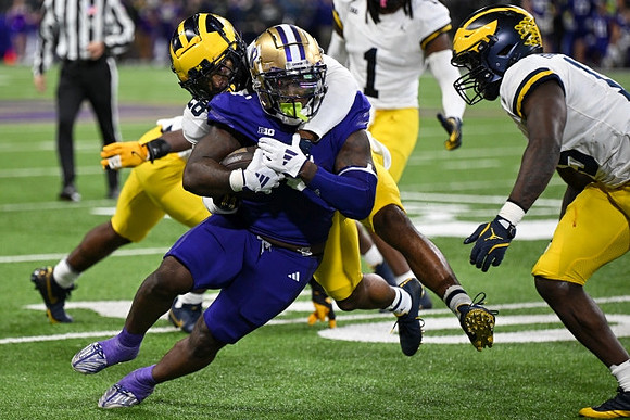 Quinten Johnson (28), Jaishawn Barham (1), and Ernest Hausmann (15)