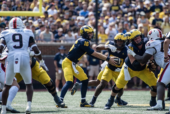 Davis Warren (16), Kalel Mullings (20), and Greg Crippen (51)