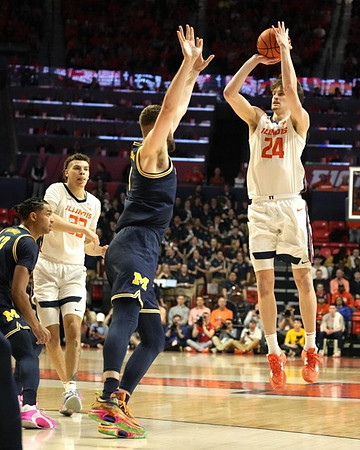 Jett Howard (13) and Hunter Dickinson (1)