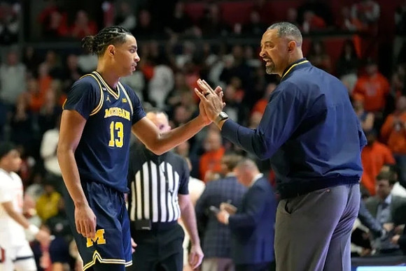 Jett Howard (13) and Juwan Howard
