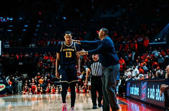Jett Howard (13) and Juwan Howard