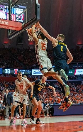 Illinois Head Coach Brad Underwood, Will Tschetter (42), and Hunter Dickinson (1)