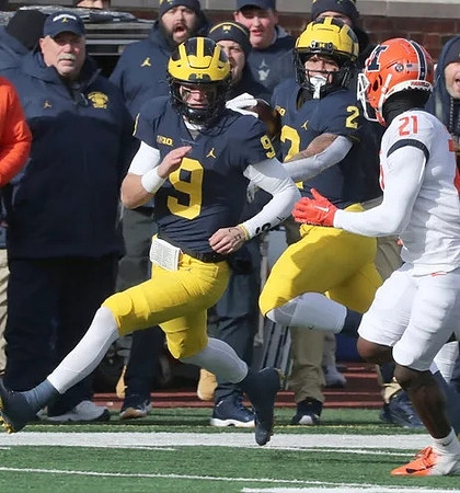 J.J. McCarthy (9) and Blake Corum (2)