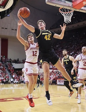 Will Tschetter (42) and Hunter Dickinson (1)