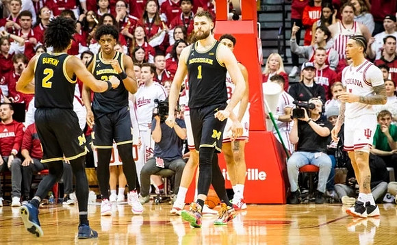 Kobe Bufkin (2), Tarris Reed Jr. (32), and Hunter Dickinson (1)