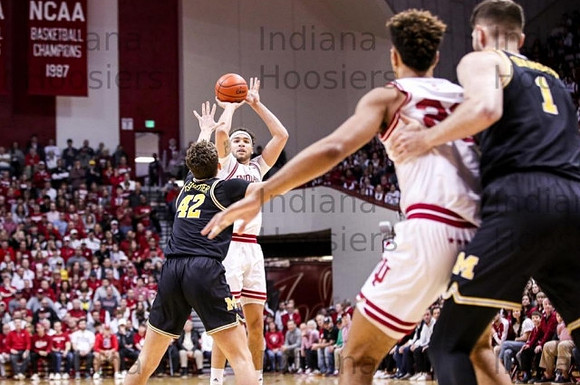 Will Tschetter (42) and Hunter Dickinson (1)