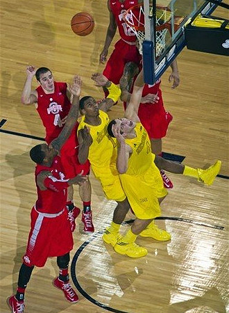 Glenn Robinson III (1) and Mitch McGary (4)
