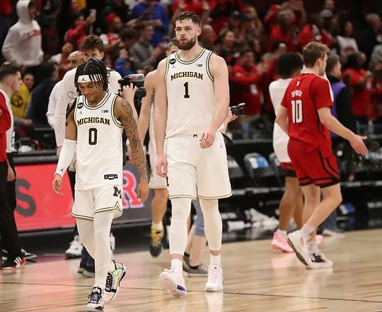 Dug McDaniel (0) and Hunter Dickinson (1)