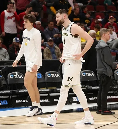 Will Tschetter (42) and Hunter Dickinson (1)