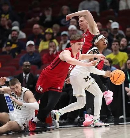 Joey Baker (15) and Dug McDaniel (0)