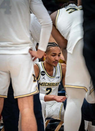 Kobe Bufkin (2) and Tarris Reed Jr. (32)