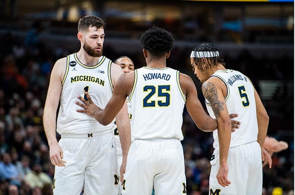 Hunter Dickinson (1), Kobe Bufkin (2), Jace Howard (25), and Terrance Williams II (5)