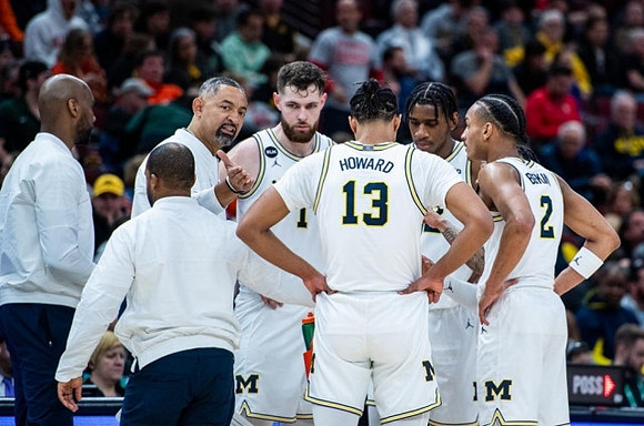 Juwan Howard, Hunter Dickinson (1), Jett Howard (13), Tarris Reed Jr. (32), and Kobe Bufkin (2)