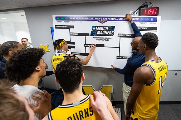 Terrance Williams II (5) and Michigan Team