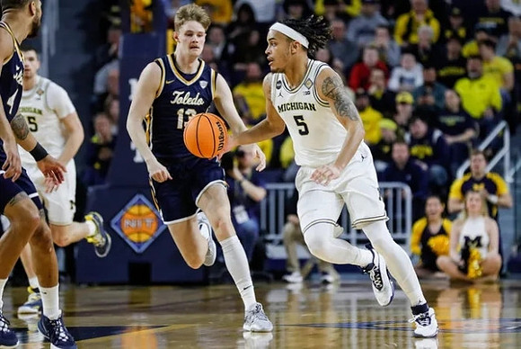Joey Baker (15) and Terrance Williams II (5)