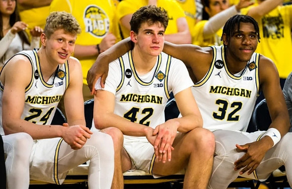 Jace Howard (25), Will Tschetter (42), and Tarris Reed Jr. (32)