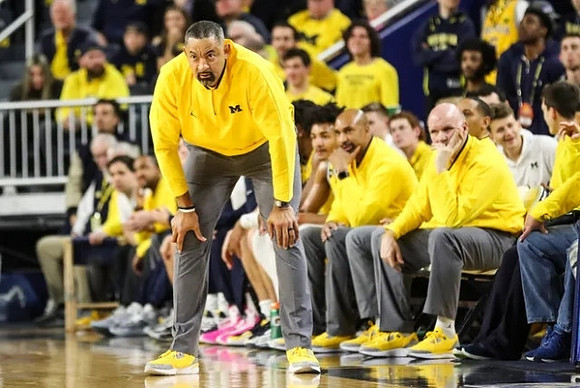 Juwan Howard, Saddi Washington, and Phil Martelli
