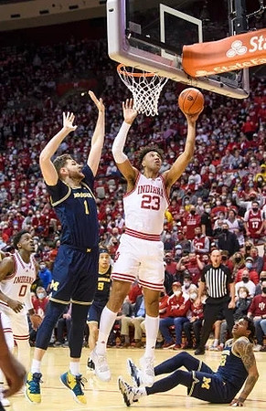 Hunter Dickinson (1) and Eli Brooks (55)