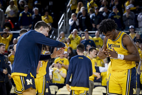 Will Tschetter (42) and Tarris Reed Jr. (32)