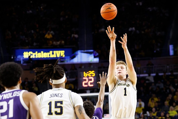 Rubin Jones (15) and Danny Wolf (1)
