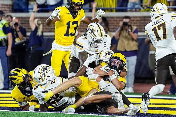 Mason Bonner (18), Travis Johnson (13), and JJ Buchanan (6)
