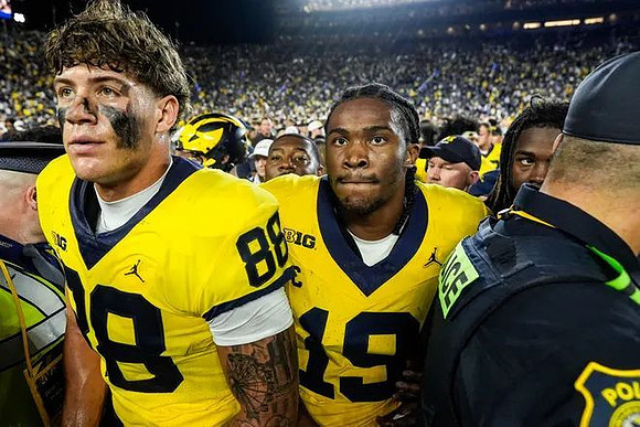Deakon Tonielli (88) and Bryce Underwood (19)