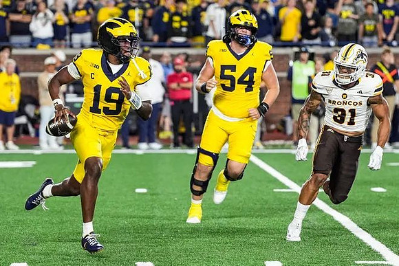Bryce Underwood (19) and Andrew Sprague (54)