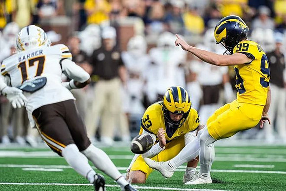 Cam Brown (33) and Trey Butkowski (99)