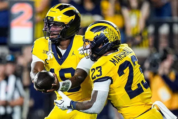 Bryce Underwood (19) and Jordan Marshall (23)