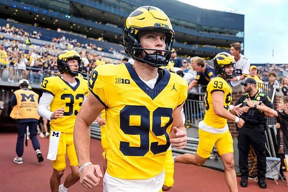 Cam Brown (33), Trey Butkowski (99), and Hunter Robertson (93)