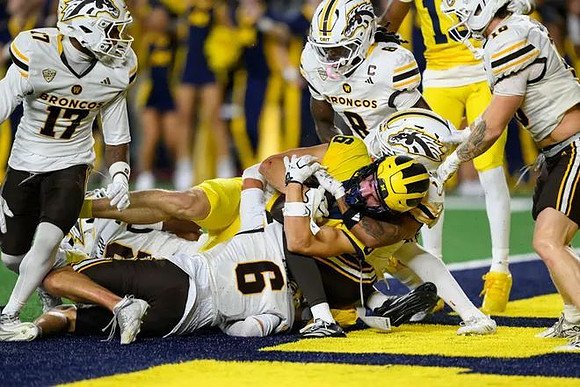 JJ Buchanan (6) and Travis Johnson (13)